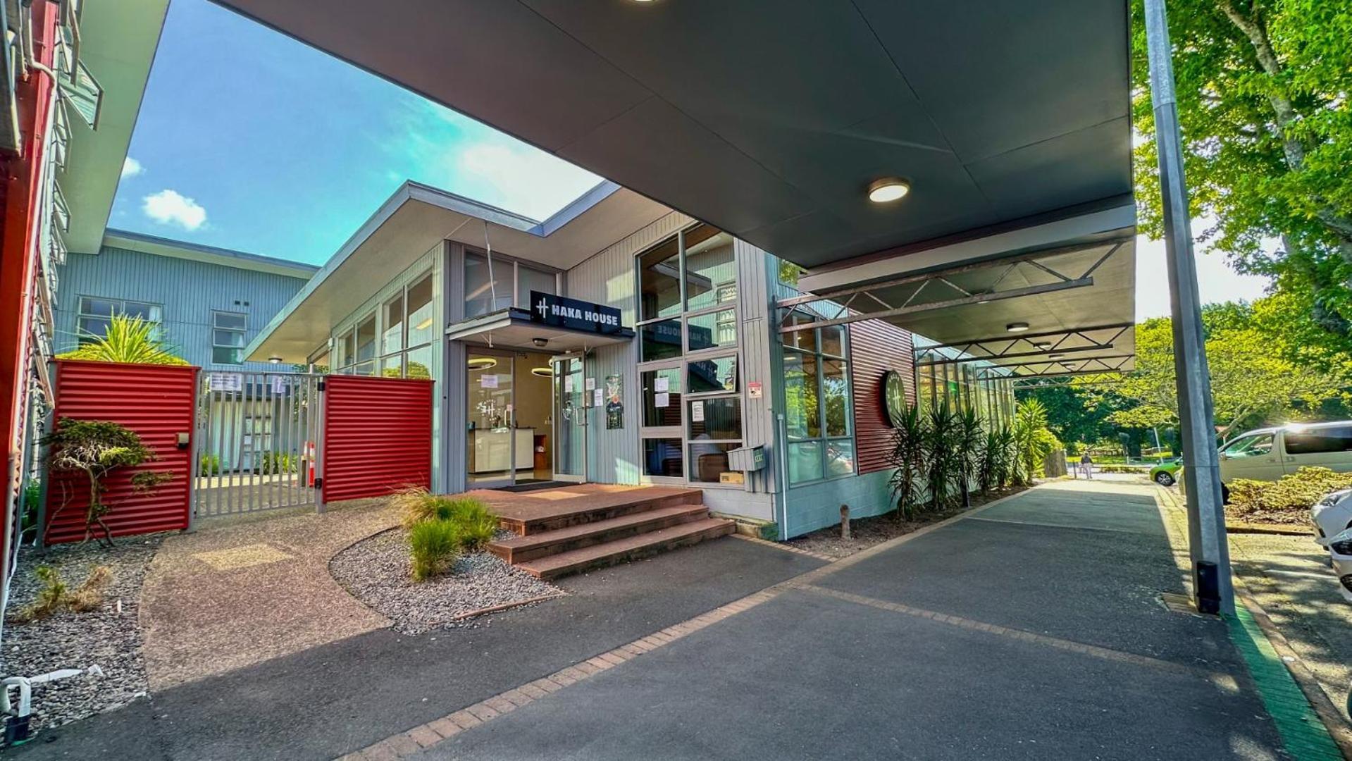 Haka House Rotorua Hostel Exterior photo The main entrance of the school